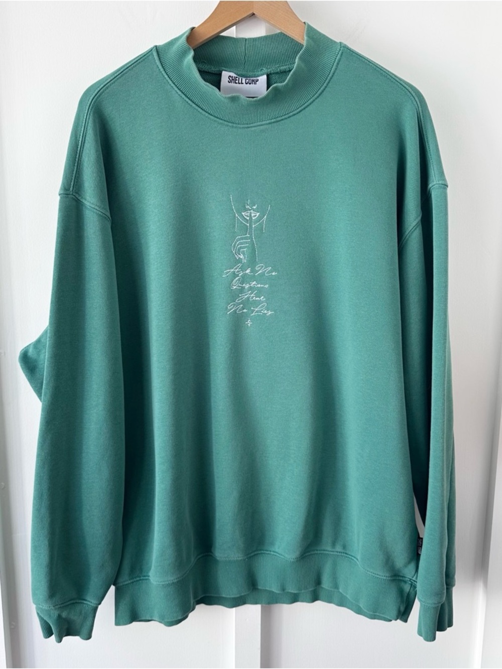 SHELL CORP green ask no questions sweatshirt